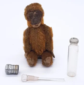 Schuco vintage Perfume Bottle Monkey, German, circa 1920's-30's, cinnamon mohair